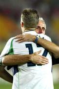 16 June 2002; Republic of Ireland manager Mick McCarthy consoles Niall Quinn following their side's defeat during the FIFA World Cup 2002 Round of 16 match between Spain and Republic of Ireland at Suwon World Cup Stadium in Suwon, South Korea. Photo by David Maher/Sportsfile