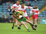 16 June 2002; Christy Toye of Donegal in action against Ciaran McNally of Derry during the Bank of Ireland Ulster Senior Football Championship Semi-Final match between Donegal and Derry at St TiernachÕs Park in Clones, Monaghan. Photo by Damien Eagers/Sportsfile