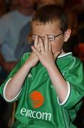 16 June 2002; GAA and Republic of Ireland fan Oisin Moran reacts whilst watching the FIFA World Cup 2002 Round of 16 match between Spain and Republic of Ireland in South Korea, prior to the Ulster Football Championship Semi-Final match between Donegal and Derry St TiernachÕs Park in Clones, Monaghan. Photo by Aoife Rice/Sportsfile