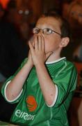 16 June 2002; GAA and Republic of Ireland fan Oisin Moran reacts whilst watching the FIFA World Cup 2002 Round of 16 match between Spain and Republic of Ireland in South Korea, prior to the Ulster Football Championship Semi-Final match between Donegal and Derry St TiernachÕs Park in Clones, Monaghan. Photo by Aoife Rice/Sportsfile