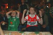 16 June 2002; GAA and Republic of Ireland fans, brothers Oisin, left, and Martin Moran react whilst watching the FIFA World Cup 2002 Round of 16 match between Spain and Republic of Ireland in South Korea, prior to the Ulster Football Championship Semi-Final match between Donegal and Derry St TiernachÕs Park in Clones, Monaghan. Photo by Aoife Rice/Sportsfile