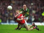 16 June 2002; Anthony Lynch of Cork in action against John Crowley of Kerry during the Bank of Ireland Munster Senior Football Championship Semi-Final match between Kerry and Cork at Fitzgerald Stadium in Killarney, Kerry. Photo by Brendan Moran/Sportsfile