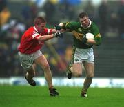 16 June 2002; Tomás î SŽ of Kerry in action against Sean Levis of Cork during the Bank of Ireland Munster Senior Football Championship Semi-Final match between Kerry and Cork at Fitzgerald Stadium in Killarney, Kerry. Photo by Brendan Moran/Sportsfile