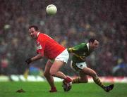 16 June 2002; Colin Corkery of Cork in action against Seamus Moynihan of Kerry during the Bank of Ireland Munster Senior Football Championship Semi-Final match between Kerry and Cork at Fitzgerald Stadium in Killarney, Kerry. Photo by Brendan Moran/Sportsfile