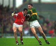 16 June 2002; Darragh î SŽ of Kerry in action against Michael O'Sullivan of Cork during the Bank of Ireland Munster Senior Football Championship Semi-Final match between Kerry and Cork at Fitzgerald Stadium in Killarney, Kerry. Photo by Brendan Moran/Sportsfile