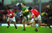 16 June 2002; Darragh î SŽ of Kerry in action against Joe Kavanagh, left, and Martin Cronin of Cork during the Bank of Ireland Munster Senior Football Championship Semi-Final match between Kerry and Cork at Fitzgerald Stadium in Killarney, Kerry. Photo by Brendan Moran/Sportsfile