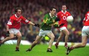 16 June 2002; Tom O'Sullivan of Kerry in action against Alan Cronin of Cork during the Bank of Ireland Munster Senior Football Championship Semi-Final match between Kerry and Cork at Fitzgerald Stadium in Killarney, Kerry. Photo by Brendan Moran/Sportsfile