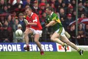 16 June 2002; Brendan Ger O'Sullivan of Cork in action against Tomás î SŽ of Kerry during the Bank of Ireland Munster Senior Football Championship Semi-Final match between Kerry and Cork at Fitzgerald Stadium in Killarney, Kerry. Photo by Brendan Moran/Sportsfile