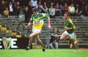 15 June 2002; Brendan Murphy of Offaly in action against Kevin Dowd of Meath during the Guinness All-Ireland Senior Hurling Championship Qualifying Round 1 match between Meath and Offaly at Páirc Tailteann in Navan, Meath. Photo by Aoife Rice/Sportsfile