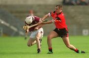 15 June 2002; Michael Pucci of Down in action against David Tierney of Galway during the Guinness All-Ireland Senior Hurling Championship Qualifing Round 1 match between Galway and Down at Casement Park in Belfast. Photo by Damien Eagers/Sportsfile