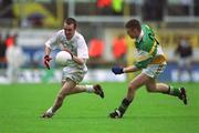 16 June 2002; Eddie McCormack of Kildare in action against Cathal Daly of Offaly during the Bank of Ireland Leinster Senior Football Championship Semi-Final match between Kildare and Offaly at Nowlan Park in Kilkenny. Photo by Ray McManus/Sportsfile