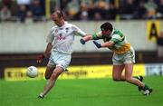 16 June 2002; Killian Brennan of Kildare in action against Ciaran McManus of Offaly during the Bank of Ireland Leinster Senior Football Championship Semi-Final match between Kildare and Offaly at Nowlan Park in Kilkenny. Photo by Ray McManus/Sportsfile