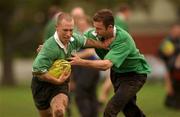 18 June 2002; Peter Stringer, left, is tackled by Geordan Murphy during an Ireland Rugby squad training session at The Teachers Eastern Rugby Club in Auckland, New Zealand. Photo by Matt Browne/Sportsfile