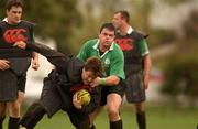 18 June 2002; Shane Byrne is tackled by team-mate Reggie Corrigan during an Ireland Rugby squad training session at The Teachers Eastern Rugby Club in Auckland, New Zealand. Photo by Matt Browne/Sportsfile