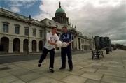 18 June 2002; Bray Emmett's GAA Club, Wicklow, in association with MBNA Europe Bank Limited have commenced the search for the longest kicker of a Gaelic Football in Ireland. Pictured at a photocall in front of the Custom House to promote the event are Kildare captain Anthony Rainbow, left, and Dublin captain Comann Goggins who attempted to kick a ball across the Liffey as they get some practise in ahead of this year's MBNA Kick Fada. Photo by Ray McManus/Sportsfile