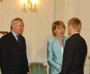 18 June 2002; President of Ireland Mary McAleese accompanied by An Taoiseach Bertie Aherne, T.D. greets Republic of Ireland's Damien Duff during a reception at çras an Uachtaráin prior to the Republic of Ireland homecoming in Phoenix Park, Dublin, following the 2002 FIFA World Cup Finals in South Korea and Japan. Photo by Aoife Rice/Sportsfile