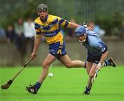 15 June 2002; Conor Plunkett of Clare in action against Dublin's Kevin flynn during the Guinness All-Ireland Senior Hurling Championship Qualifying Round 1 match between Clare and Dublin at Parnell Park in Dublin. Photo by Ray McManus/Sportsfile