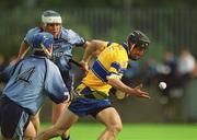 15 June 2002; Gerry Quinn of Clare in action against Kevin Flynn of Dublin during the Guinness All-Ireland Senior Hurling Championship Qualifying Round 1 match between Clare and Dublin at Parnell Park in Dublin. Photo by Ray McManus/Sportsfile