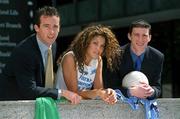 19 June 2002; Meath's Anthony Moyles, left and Dublin's Colin Moran, pictured with model Glenda Gilson from Castleknock, will have to put their friendship aside for this Sunday's Bank of Ireland Leinster Senior Football Championship Semi-Final match at Croke Park, as the two Bank of Ireland work colleagues will be on opposite sides for the big match on Sunday. Photo by Ray McManus/Sportsfile