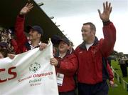 19 June 2002; Munster and Irish lock Mick Galwey with Munster Special Olympics athletes John Gleeson, left, and Colin Hynes, centre, during the 2002 Special Olympics Ireland National Games Opening Ceremony at Parnell Park in Dublin. Photo by Brendan Moran/Sportsfile