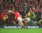 16 June 2002; John Crowley of Kerry in action against Ciaran O'Sullivan of Cork during the Bank of Ireland Munster Senior Football Championship Semi-Final match between Kerry and Cork at Fitzgerald Stadium in Killarney, Kerry. Photo by Brendan Moran/Sportsfile