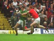 16 June 2002; Eoin Brosnan of Kerry in action against Sean Levis of Cork during the Bank of Ireland Munster Senior Football Championship Semi-Final match between Kerry and Cork at Fitzgerald Stadium in Killarney, Kerry. Photo by Brendan Moran/Sportsfile