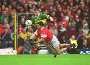 16 June 2002; Martin Cronin of Cork is tackled by Tomás î SŽ of Kerry during the Bank of Ireland Munster Senior Football Championship Semi-Final match between Kerry and Cork at Fitzgerald Stadium in Killarney, Kerry. Photo by Brendan Moran/Sportsfile