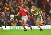16 June 2002; Fionan Murray of Cork in action against Marc î SŽ of Kerry during the Bank of Ireland Munster Senior Football Championship Semi-Final match between Kerry and Cork at Fitzgerald Stadium in Killarney, Kerry. Photo by Brendan Moran/Sportsfile