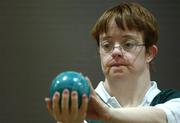 21 June 2002; Dympna Browne, from Belfast, concentrates on her shot during the 2002 Special Olympics Ireland National Games Bocce event at the RDS in Dublin. Photo by Brendan Moran/Sportsfile