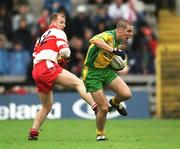 16 June 2002; Kevin Cassidy of Donegal in action against Johnny McBride of Derry during the Bank of Ireland Ulster Senior Football Championship Semi-Final match between Donegal and Derry at St TiernachÕs Park in Clones, Monaghan. Photo by Damien Eagers/Sportsfile