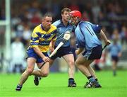 15 June 2002; Colin Lynch of Clare in action against Darragh Spain of Dublin during the Guinness All-Ireland Senior Hurling Championship Qualifying Round 1 match between Clare and Dublin at Parnell Park in Dublin. Photo by Ray McManus/Sportsfile