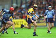 15 June 2002; Tony Griffin of Clare in action against Darragh Spain of Dublin during the Guinness All-Ireland Senior Hurling Championship Qualifying Round 1 match between Clare and Dublin at Parnell Park in Dublin. Photo by Ray McManus/Sportsfile