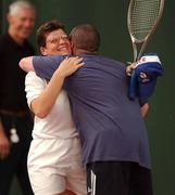 21 June 2002; Agnes Danna of Monaco, celebrates with her partner Jeff Lazzarin of Luxembourg following victory during their 2002 Special Olympics Ireland National Games Tennis Double semi-final event at Riverview Tennis Club in Clonskeagh, Dublin. Photo by Brendan Moran/Sportsfile