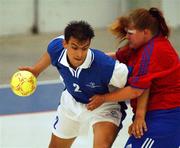 21 June 2002; Apostolos Hristodoulou of Greece in action against Marianne Ristad of Norway during their 2002 Special Olympics Ireland National Games Handball match between Greece and Norway at the National Show Centre in Swords, Dublin. Photo by David Maher/Sportsfile