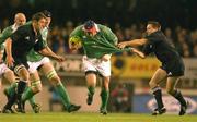 22 June 2002; Anthony Foley of Ireland is tackled by Andrew Mehrtens, right, and Chris Jack of New Zealand during the Summer Tour 2002 2nd Test match between New Zealand and Ireland at Eden Park in Auckland, New Zealand. Photo by Matt Browne/Sportsfile
