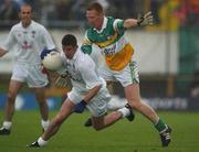 22 June 2002; Anthony Rainbow of Kildare in action against Neville Coughlan of Offaly during the Bank of Ireland Leinster Senior Football Championship Semi-Final Replay match between Kildare and Offaly at Nowlan Park in Kilkenny. Photo by Brendan Moran/Sportsfile
