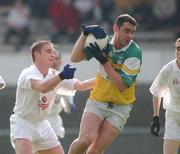 22 June 2002; James Grennan of Offaly in action against Eddie McCormack of Kildare during the Bank of Ireland Leinster Senior Football Championship Semi-Final Replay match between Kildare and Offaly at Nowlan Park in Kilkenny. Photo by Brendan Moran/Sportsfile