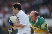 22 June 2002; Martin Lynch of Kildare in action against John Kenny of Offaly during the Bank of Ireland Leinster Senior Football Championship Semi-Final Replay match between Kildare and Offaly at Nowlan Park in Kilkenny. Photo by Brendan Moran/Sportsfile