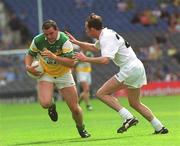 23 June 2002; Tom Crampton of Offaly in action against Pauric Kelly of Kildare during the Bank of Ireland Leinster Junior Football Championship Semi-Final match between Offaly and Kildare at Croke Park in Dublin. Photo by Brian Lawless/Sportsfile
