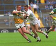 23 June 2002; Alan Mulhall of Offaly in action against Frank Ryder of Kildare during the Bank of Ireland Leinster Junior Football Championship Semi-Final match between Offaly and Kildare at Croke Park in Dublin. Photo by Brian Lawless/Sportsfile