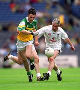 23 June 2002; Emmett Molloy of Offaly in action against Brian Gravin of Kildare during the Bank of Ireland Leinster Junior Football Championship Semi-Final match between Offaly and Kildare at Croke Park in Dublin. Photo by Damien Eagers/Sportsfile