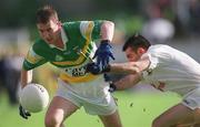 22 June 2002; Colm Quinn of Offaly in action against Ken Doyle of Kildare during the Bank of Ireland Leinster Senior Football Championship Semi-Final Replay match between Kildare and Offaly at Nowlan Park in Kilkenny. Photo by Damien Eagers/Sportsfile