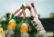 22 June 2002; James Grennan, left, and Ciaran McManus of Offaly in action against Ronan Sweeney of Kildare during the Bank of Ireland Leinster Senior Football Championship Semi-Final Replay match between Kildare and Offaly at Nowlan Park in Kilkenny. Photo by Brendan Moran/Sportsfile