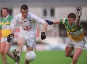 22 June 2002; John Doyle of Kildare in action against Cathal Daly of Offaly during the Bank of Ireland Leinster Senior Football Championship Semi-Final Reply match between Kildare and Offaly at Nowlan Park in Kilkenny. Photo by Brendan Moran/Sportsfile