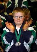 23 June 2002; Eleven year old David Clarke, from Belfast, during the 2002 Special Olympics Ireland National Games closing ceremony at the RDS in Dublin. Photo by Ray McManus/Sportsfile
