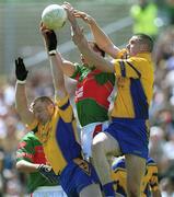 23 June 2002; Seamus O'Neill and Nigel Dineen of Roscommon in action against Gary Ruane of Mayo during the Bank of Ireland All-Ireland Senior Football Championship Qualifier Round 2 between Mayo and Roscommon at MacHale Park in Castlebar, Mayo. Photo by David Maher/Sportsfile