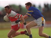 23 June 2002; Patrick Bradley of Derry is tackled by Fintan Coyle of Longford during the Bank of Ireland All-Ireland Senior Football Championship Qualifier Round 2 match between Longford and Derry at Pearse Park in Longford. Photo by Aoife Rice/Sportsfile