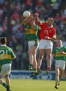 23 June 2002; Darragh î SŽ of Kerry in action against Michael O'Sullivan of Cork during the Bank of Ireland Munster Senior Football Championship Semi-Final Replay match between Cork and Kerry at Páirc U’ Chaoimh in Cork. Photo by Brendan Moran/Sportsfile