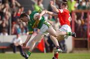 23 June 2002; Marc î SŽ of Kerry in action against Cork's Philip Clifford of Cork during the Bank of Ireland Munster Senior Football Championship Semi-Final Replay match between Cork and Kerry at Páirc U’ Chaoimh in Cork. Photo by Brendan Moran/Sportsfile