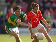 23 June 2002; Alan Cronin of Cork in action against Kerry's Enda Galvin during the Bank of Ireland Munster Senior Football Championship Semi-Final Replay match between Cork and Kerry at Páirc U’ Chaoimh in Cork. Photo by Brendan Moran/Sportsfile